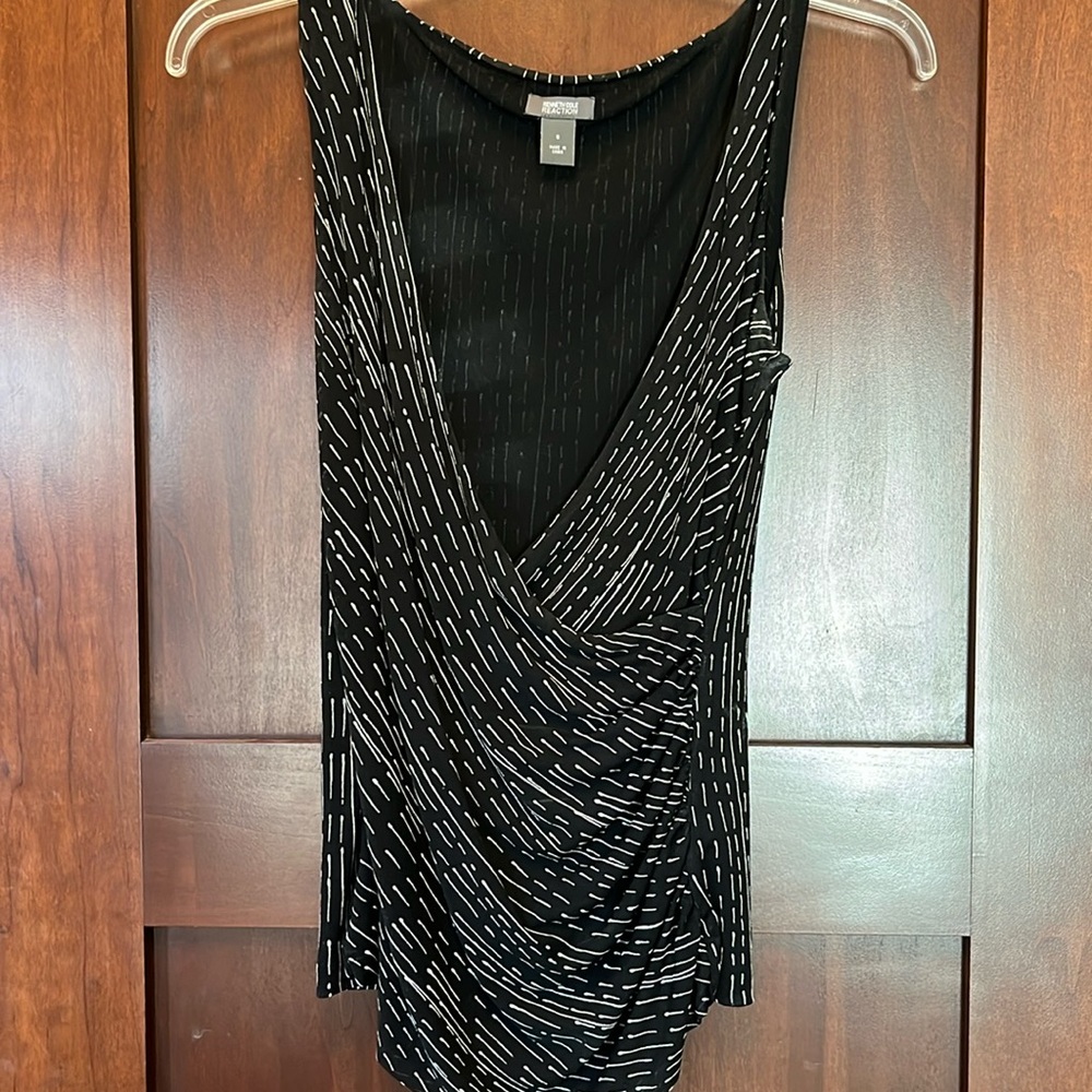 Kenneth Cole sleeveless wrap top.    Black and white dressy wrap top.